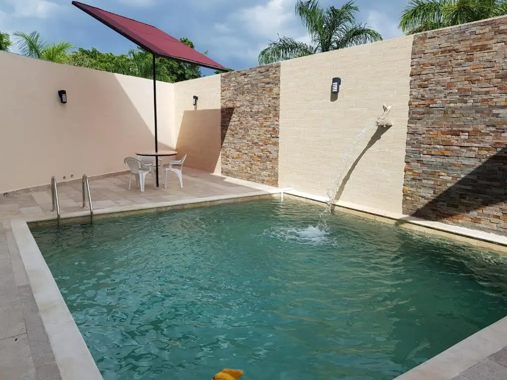 Outdoor swimming pool at Hotel Boutique La Toja Campeche